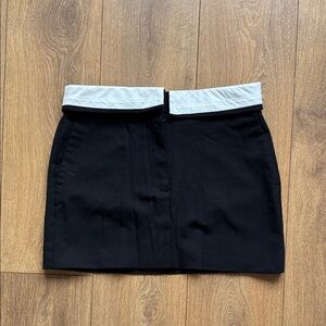 Babaton Black Mini Skirt with Cream Accent